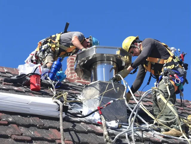 Protective chimney cap installed by Storrs Chimney Sweep in Storrs, CT