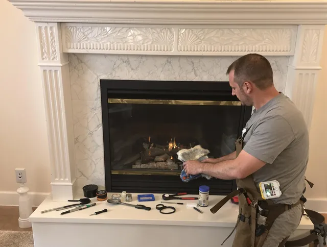 Storrs Chimney Sweep performing fireplace maintenance in Storrs, CT